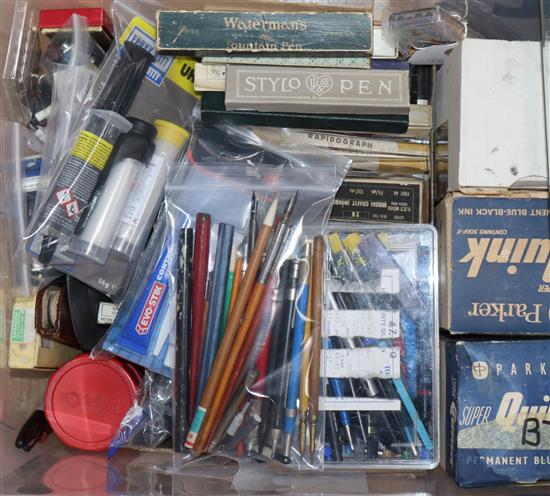 A large collection of writing equipment to include pens, pencils, ink, parts and nibs